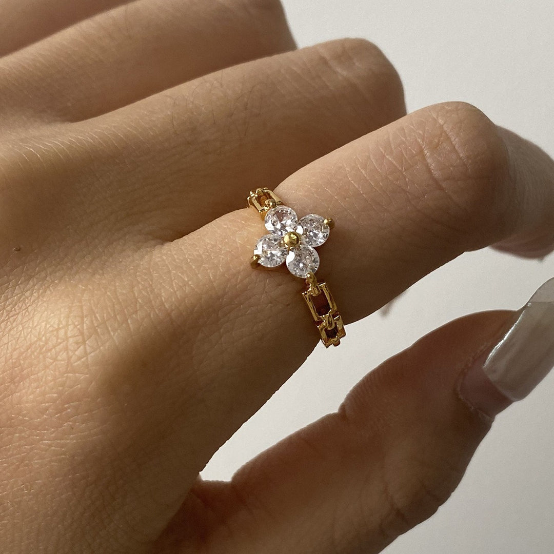 Flower-shaped gemstone-set ring worn on hand, alternate image 2