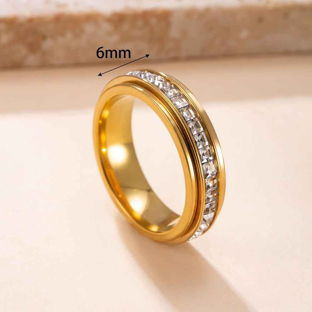 18K gold titanium rotating anxiety-relief ring.